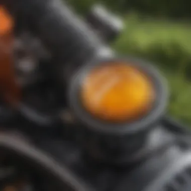 Close-up of lawn mower engine showing oil fill cap