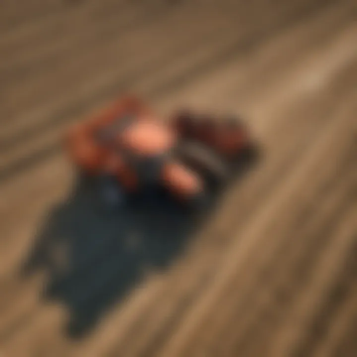 Aerial view of agricultural land showcasing the versatility of Kioti tractors in use