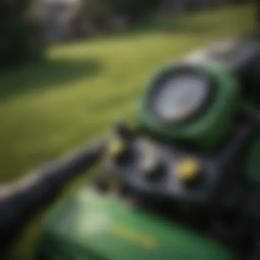 Close-up view of John Deere lawn mower with power steering controls
