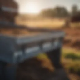 Durable metal feed troughs in a pasture