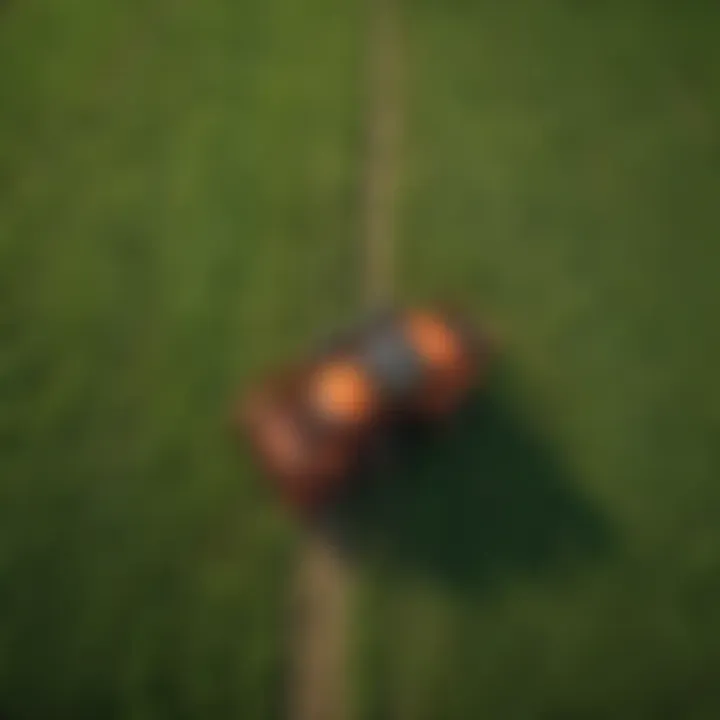 An aerial view of a rollatiller at work in a vibrant, green field.