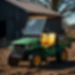 A classic John Deere Gator model in a rustic farm setting
