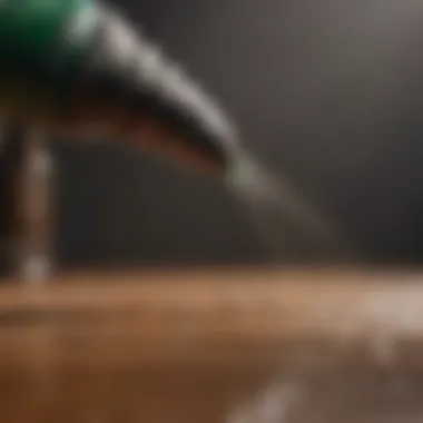 A close-up of a spray nozzle with pesticide solution