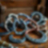 Different types of horse shoes arranged on a wooden table