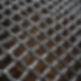 Close-up view of various galvanized wire mesh sizes used in farming applications