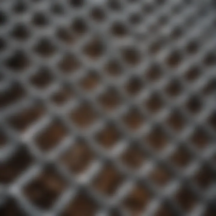Close-up view of various galvanized wire mesh sizes used in farming applications
